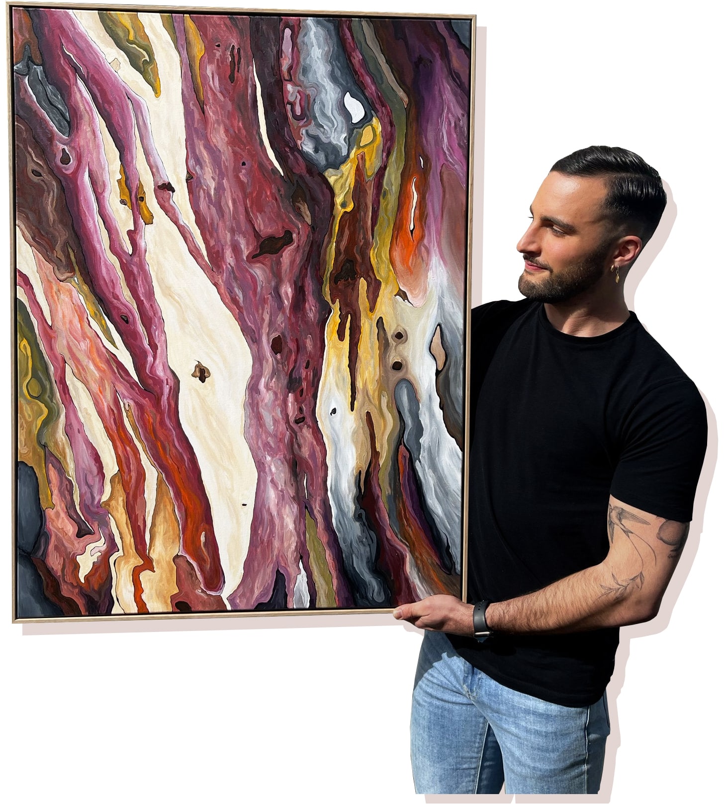 Joshua De Matteo with one of his paintings